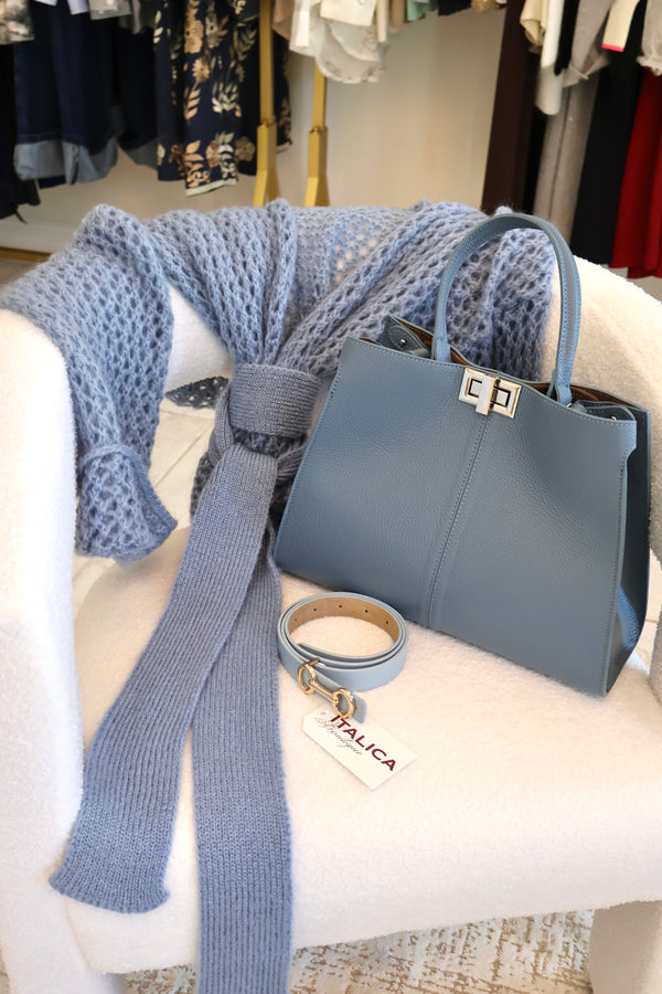 Hard-shaped blue bag